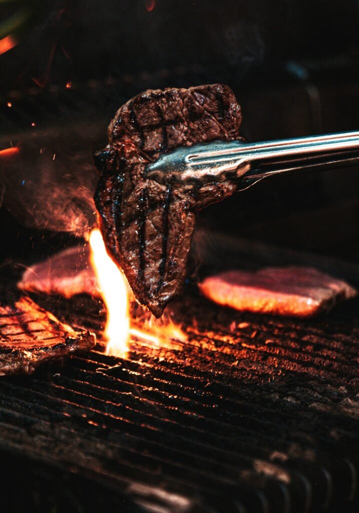 Rib eye steak seared over charcoal